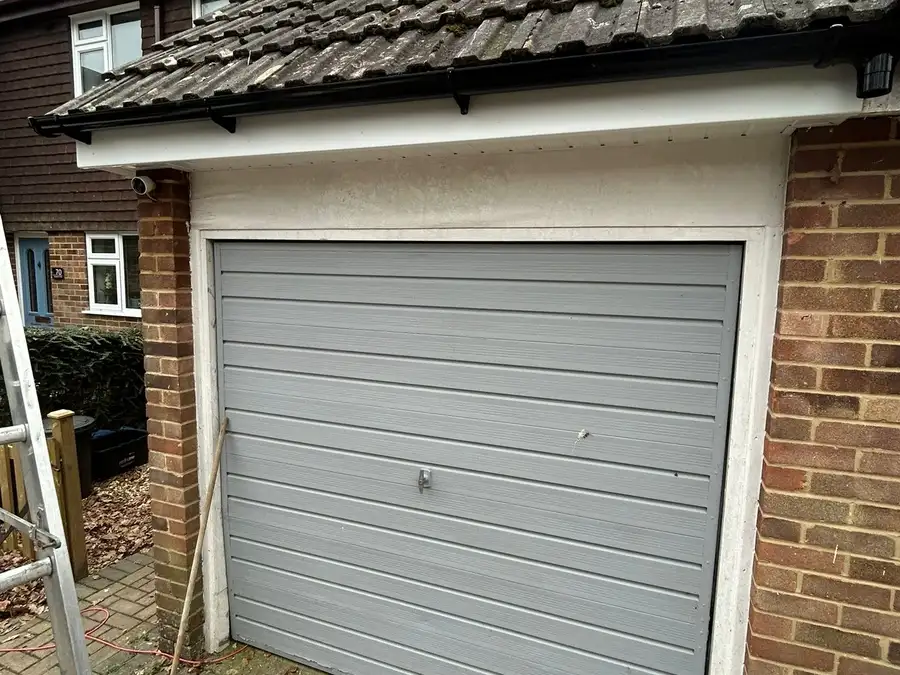 Fascia & guttering — after, new white fascia board and black guttering fitted