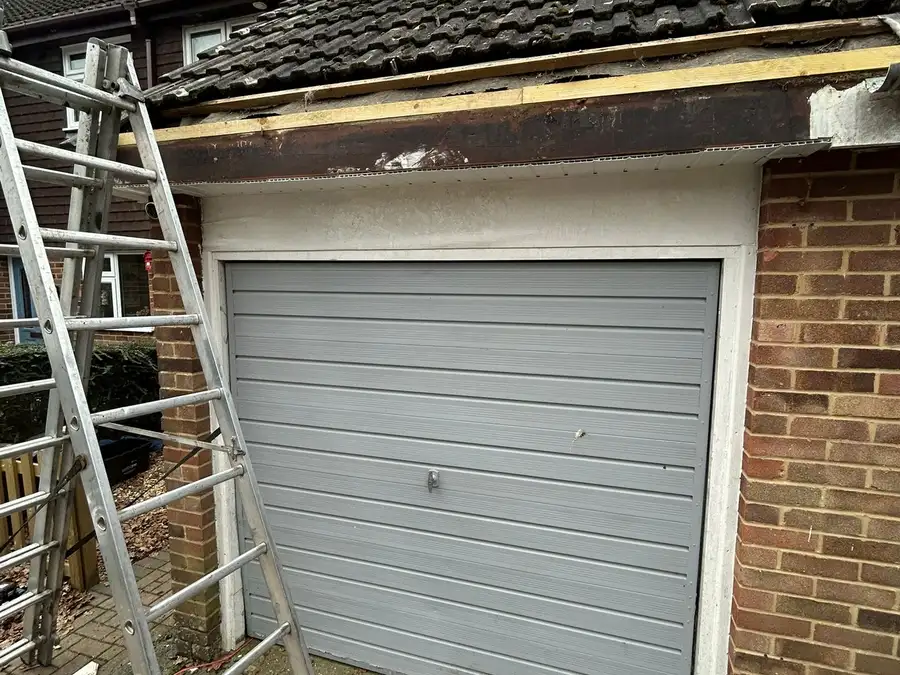 Fascia & guttering — before, old fascia exposed and guttering removed