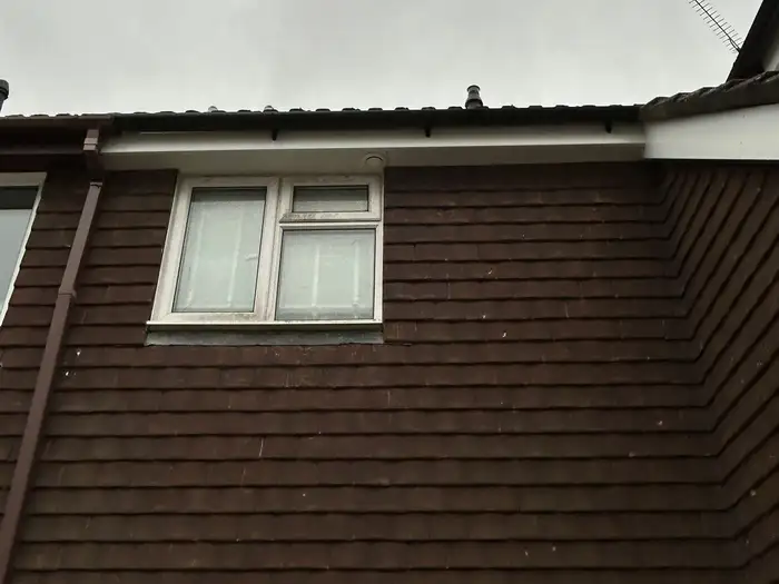 Fascia — after, new white fascia board fitted