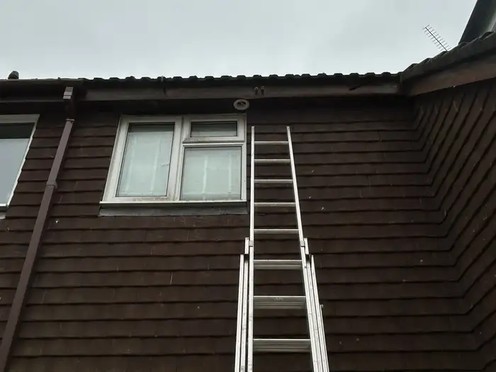 Fascia — before, old fascia board along the roofline