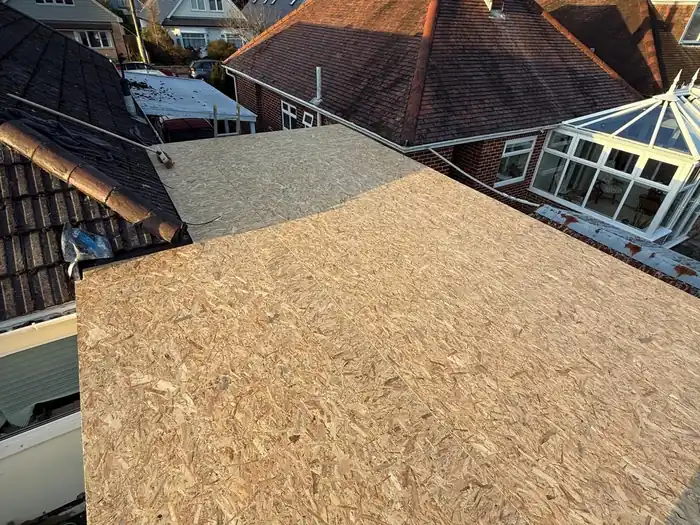 Flat roof extension — before, OSB deck ready for the EPDM covering, viewed from the other side