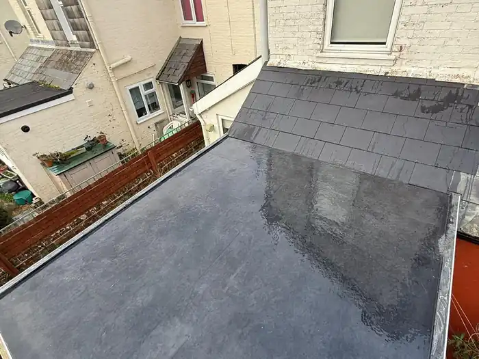 Flat roof recover — after, new EPDM roof covering fitted