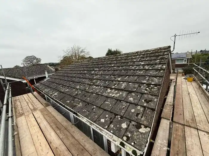 Full re-roof — before, lichen build-up on the old tiles