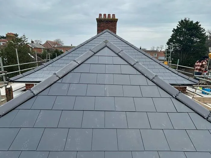 Full re-roof — finished, close on the ridge and chimney