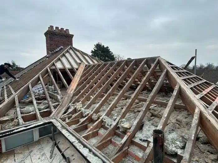 Full re-roof — stripped back, ready for the new roof