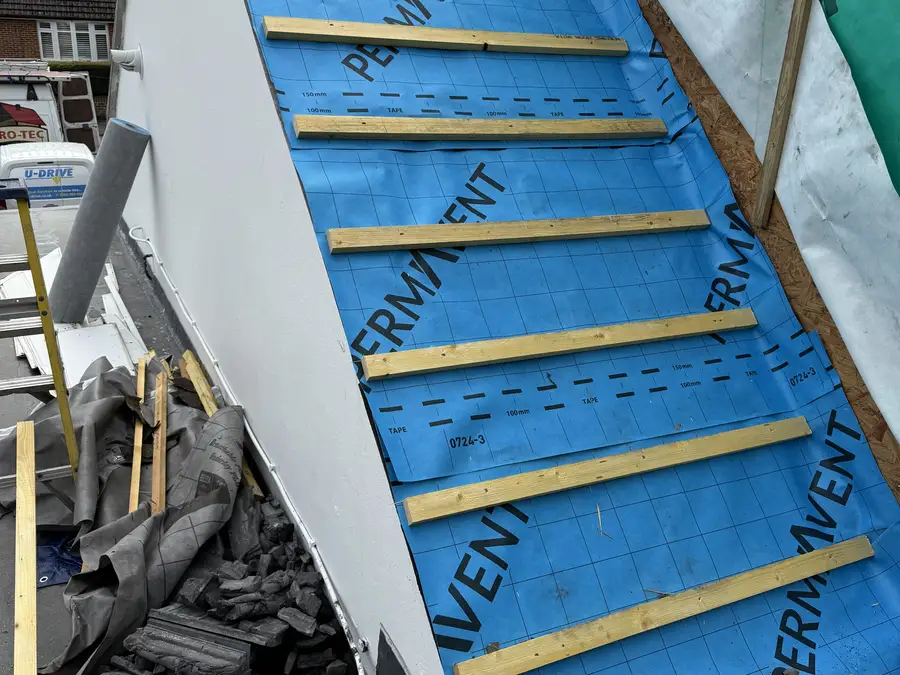 Roof repair — breather membrane and battens complete, ready for tiling
